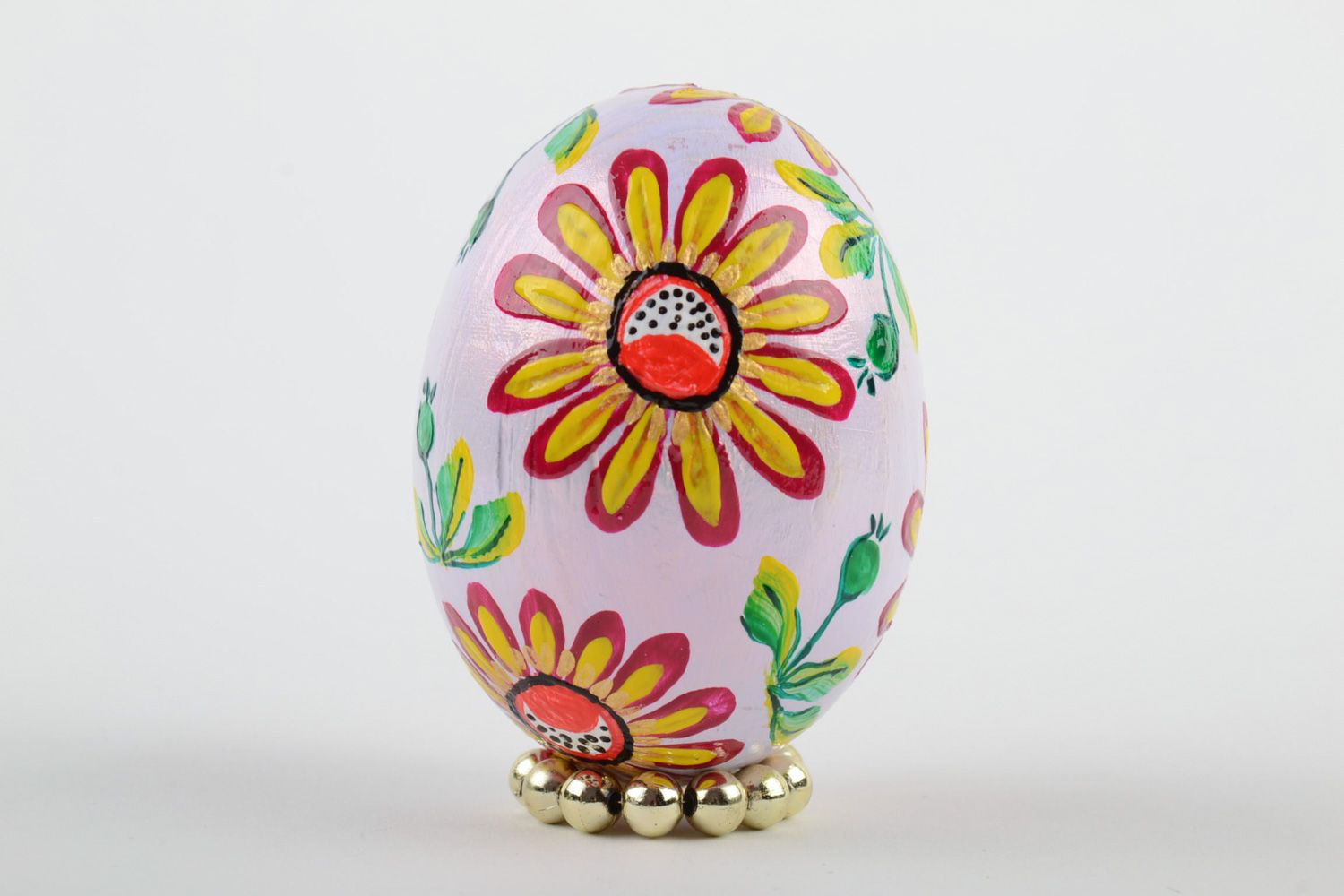 Handmade painted wooden Easter egg with bright flower son white background photo 2