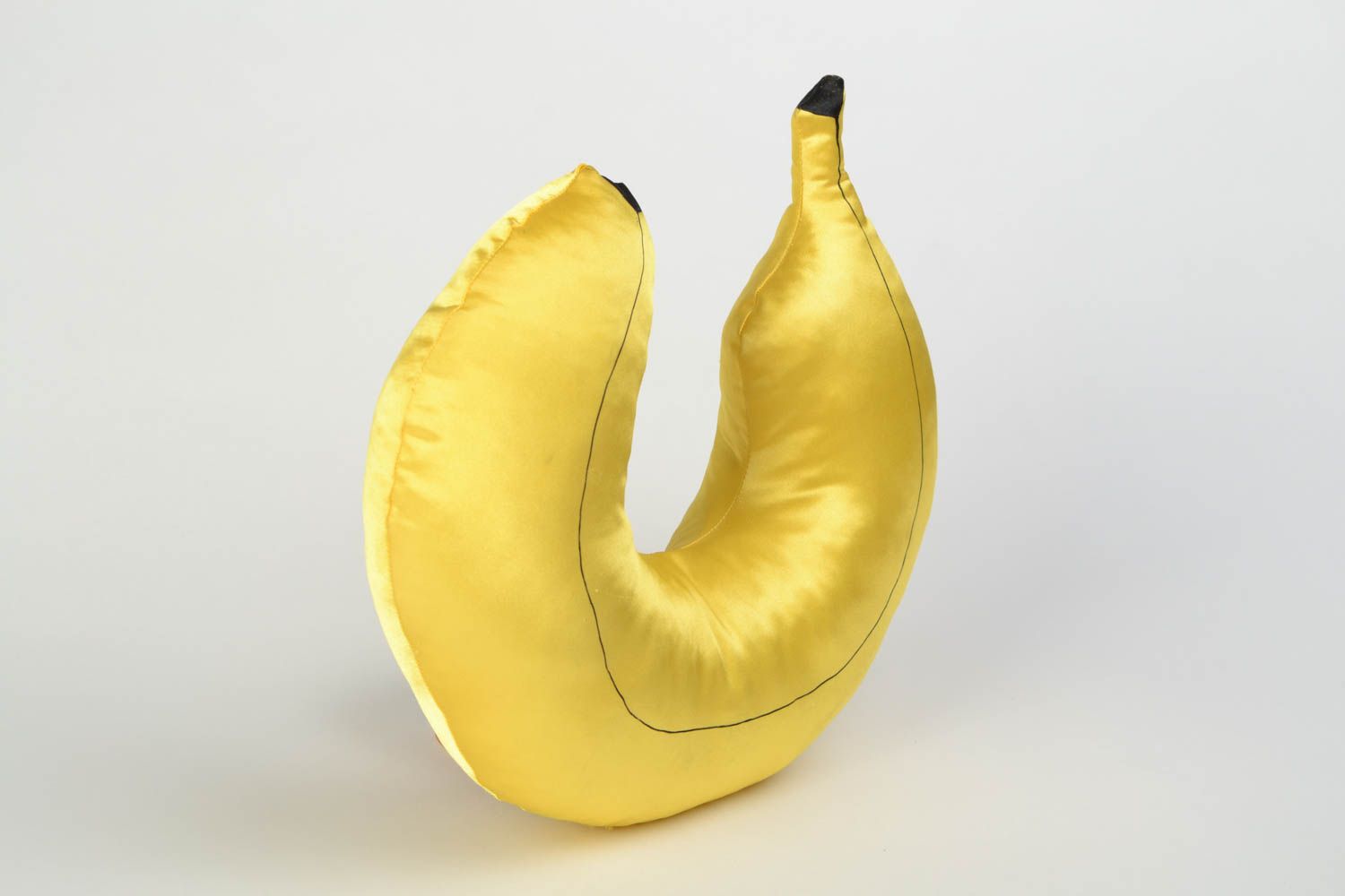 Handmade yellow satin travel pillow in the shape of banana photo 5