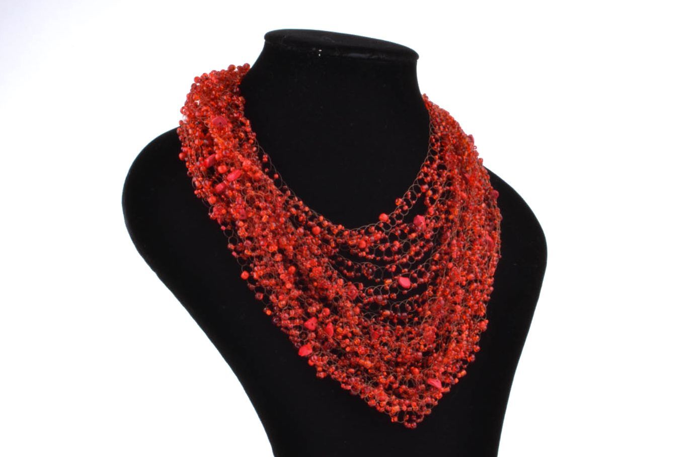 Red necklace made of beads and natural stones photo 1