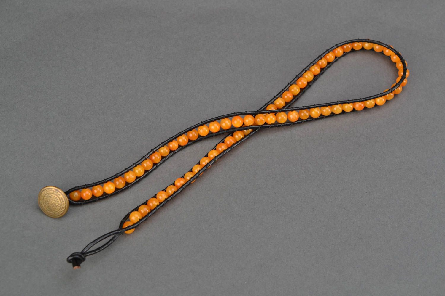 Orange leather beaded bracelet in three rows photo 3