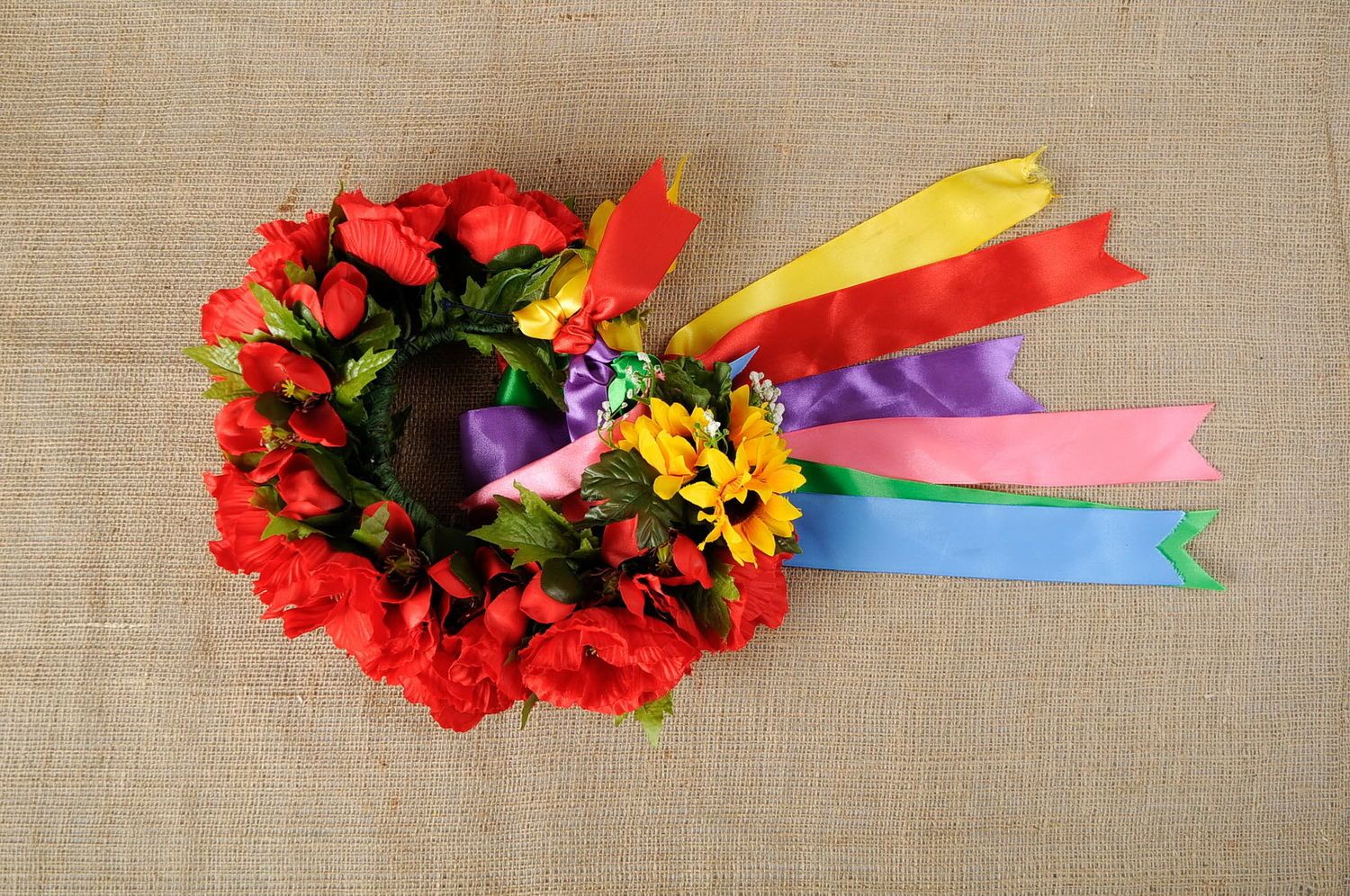 Wreath made of artificial flowers photo 1