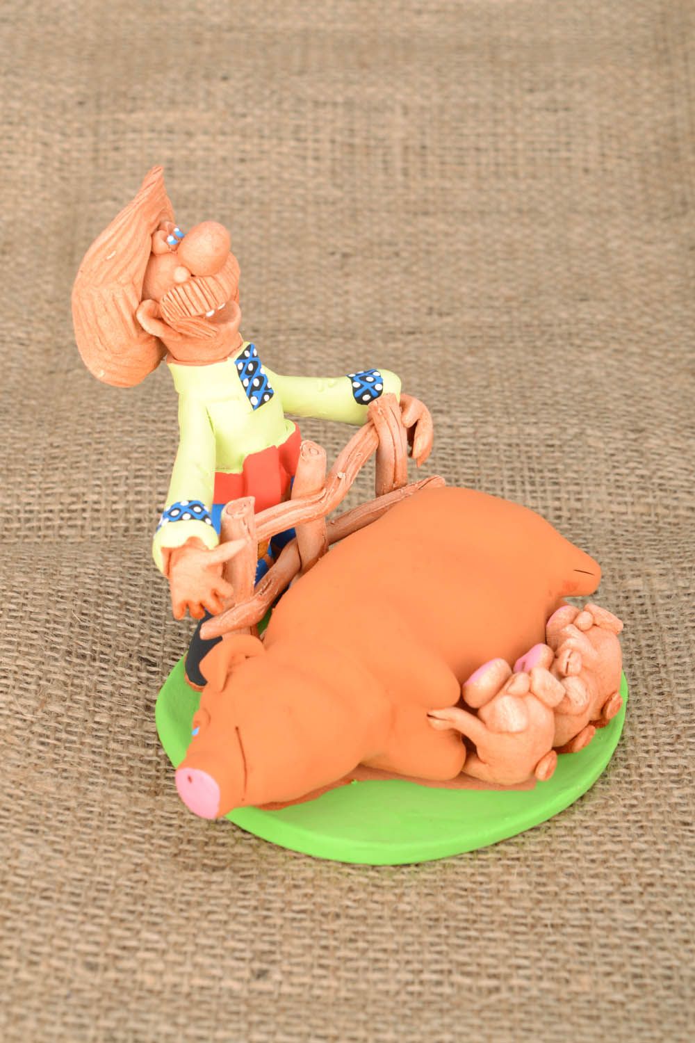 Keramik Statuette Kosak mit Schweinen foto 1