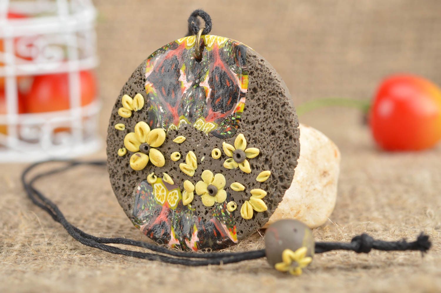 Handmade round grey pendant made of polymer clay decorated with yellow flowers photo 1