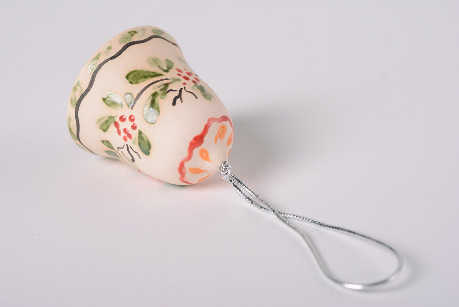 Handmade tender decorative maiolica ceramic bell with floral glaze painting photo 5