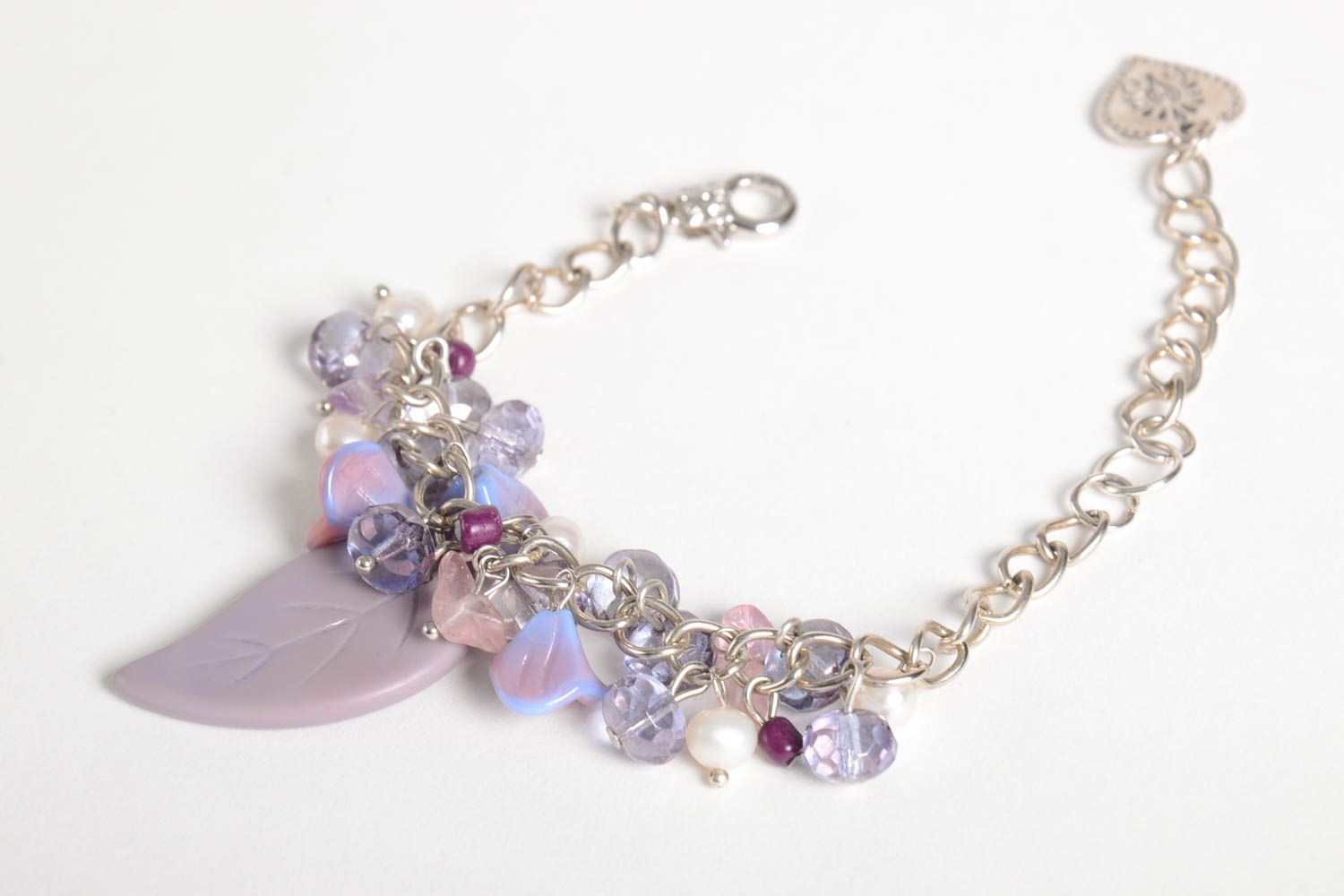 Chain handmade charm bracelet with purple and transparent beads with leaves charms photo 1