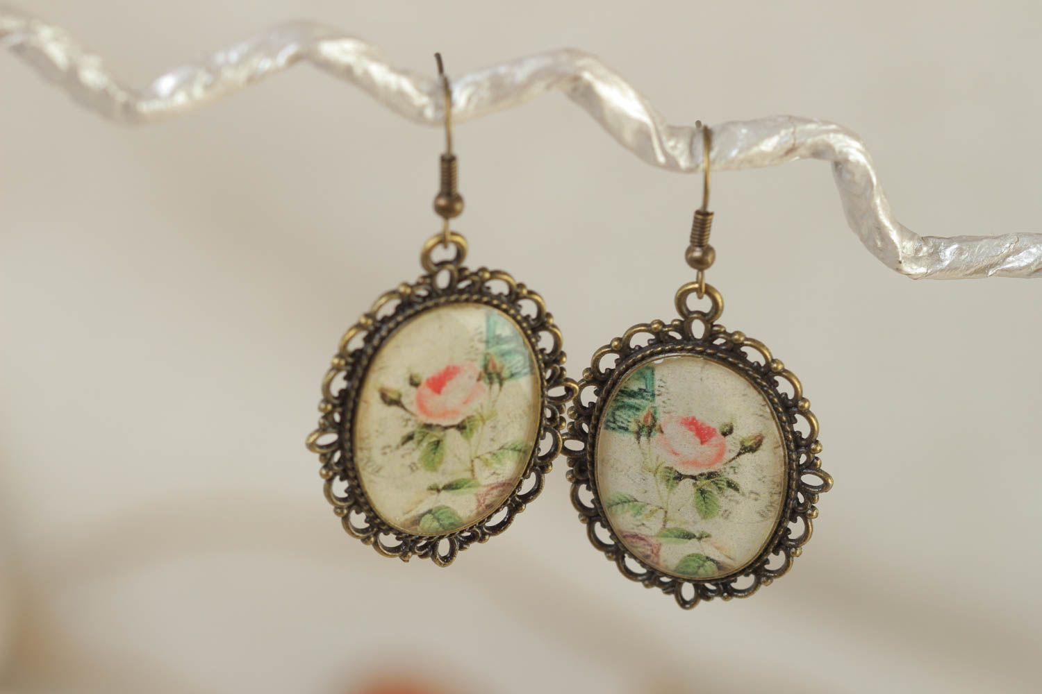 Handmade vintage oval dangling earrings with metal basis and glazed floral print photo 1
