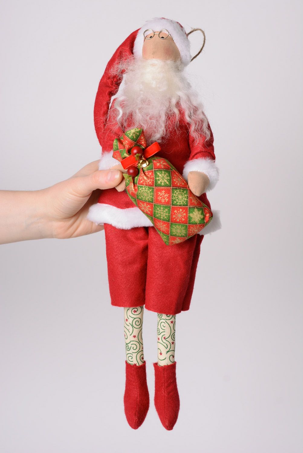 Schönes künstlerisches handgemachtes Designer Kuscheltier Weihnachtsmann aus Stoff foto 3