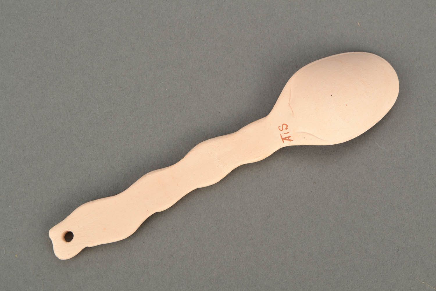 Big spoon made of white clay  photo 4