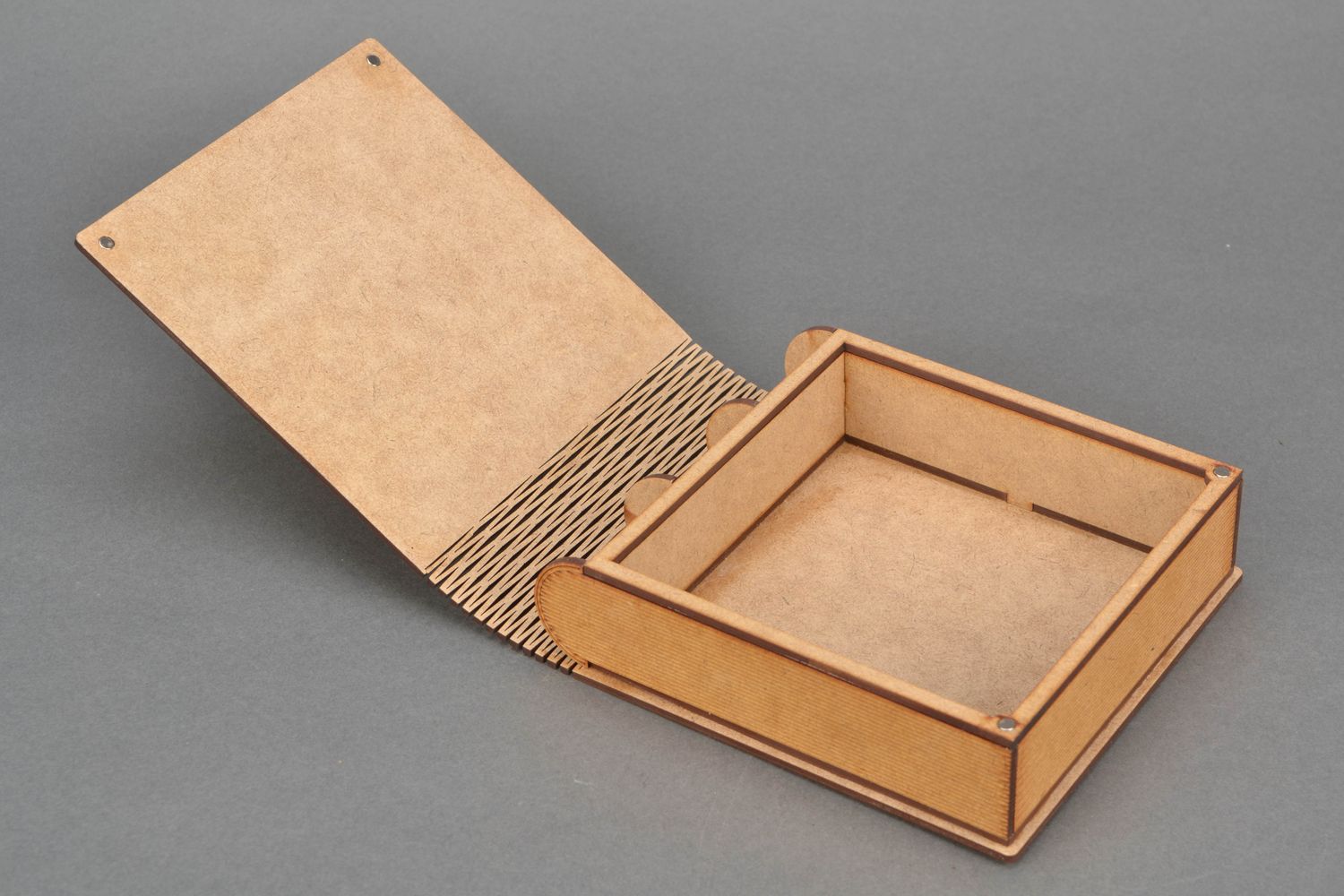 Caja de madera contrachapada con forma de libro foto 4