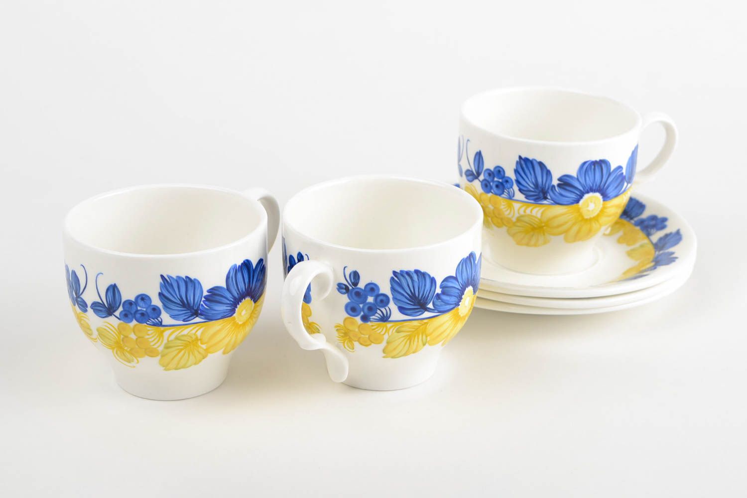 Set of 3 three porcelain white, blue, and yellow colors drinking cups with saucers photo 5