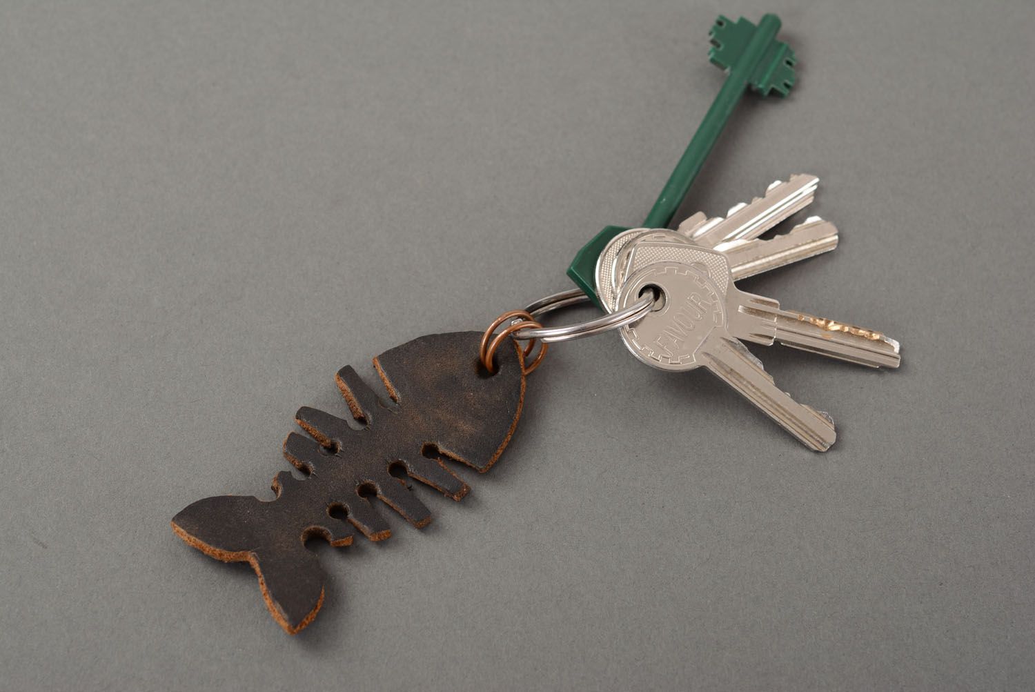 Leather key chain in the form of fish photo 1