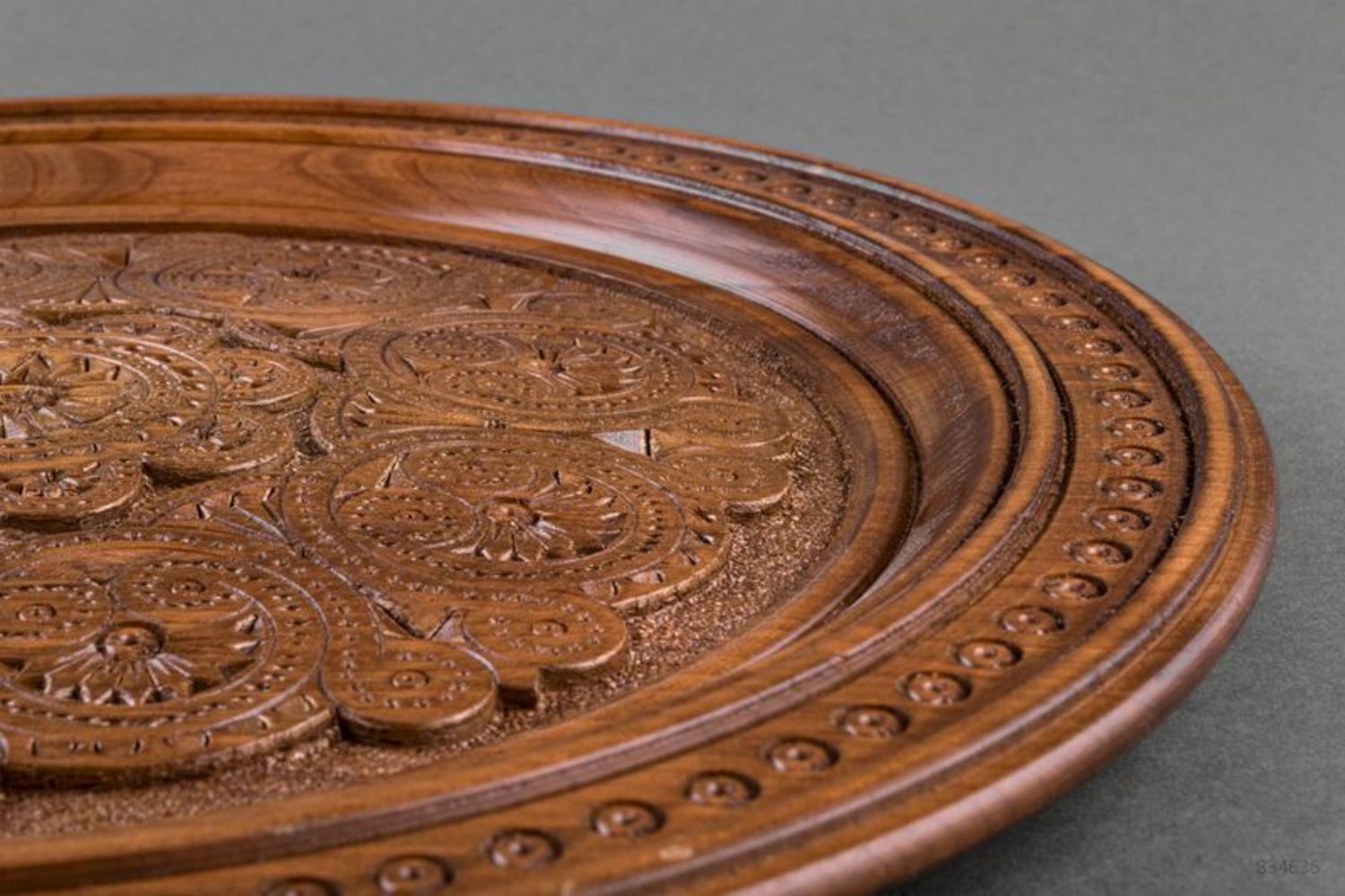 Decorative wooden plate with carving photo 2