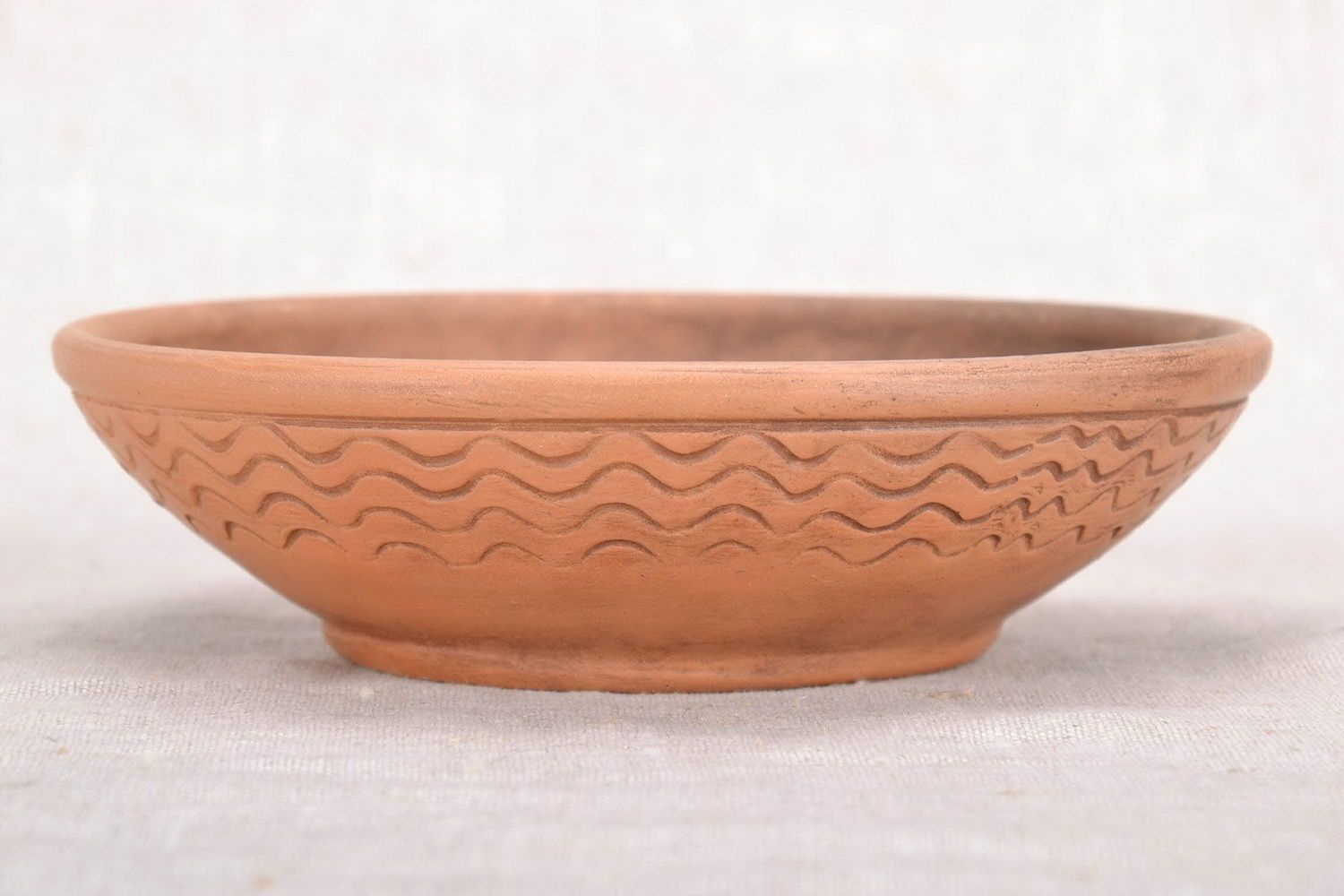 Ceramic bowl with carving photo 2