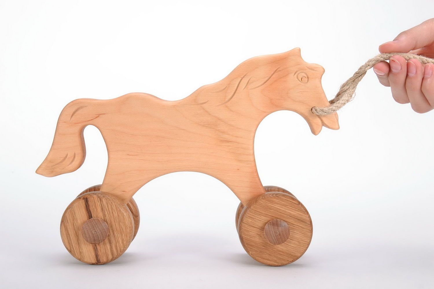 Wooden horse on a string photo 2