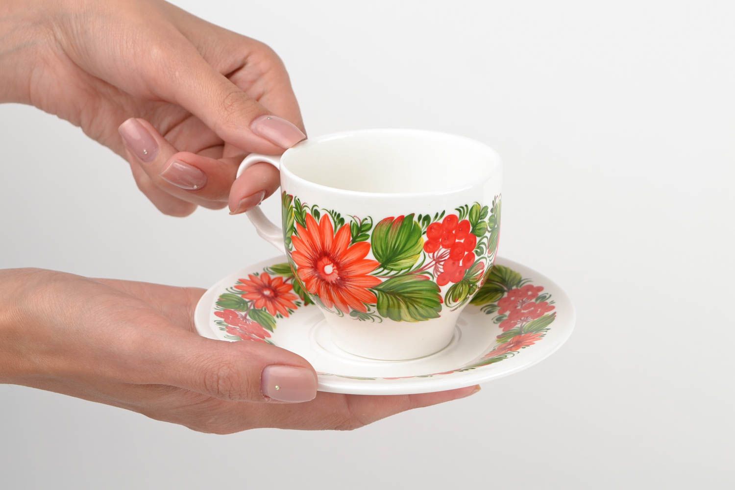 Porcelain 5 oz cup with flower pattern, handle, and saucer photo 2