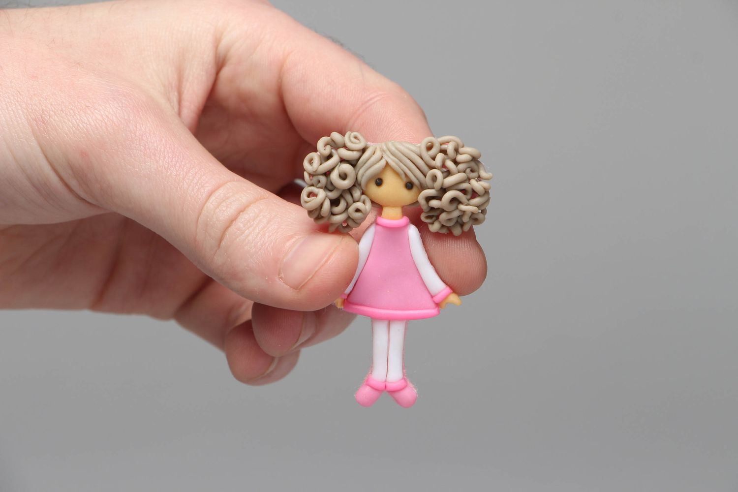 Plastic brooch in the shape of doll photo 4