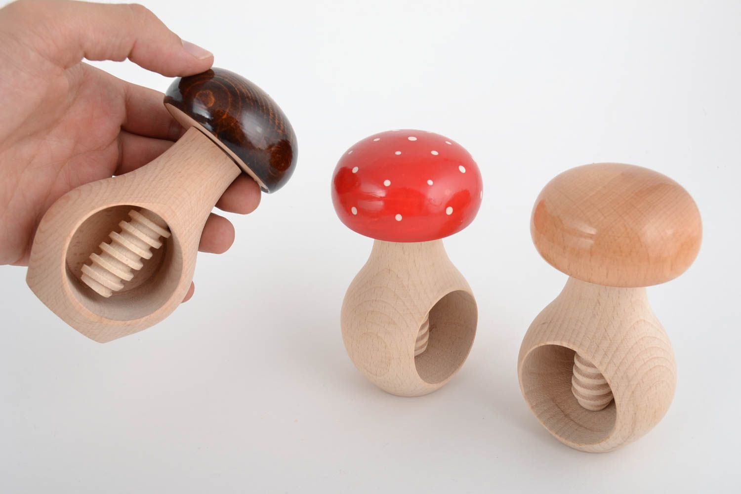 Set of handmade wooden nutcrackers Mushrooms 3 pieces for crushing nuts photo 2