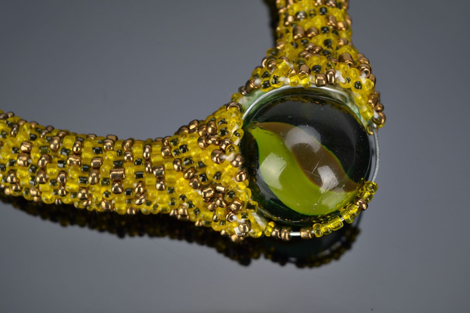 Beaded cord necklace with a glass bead photo 3