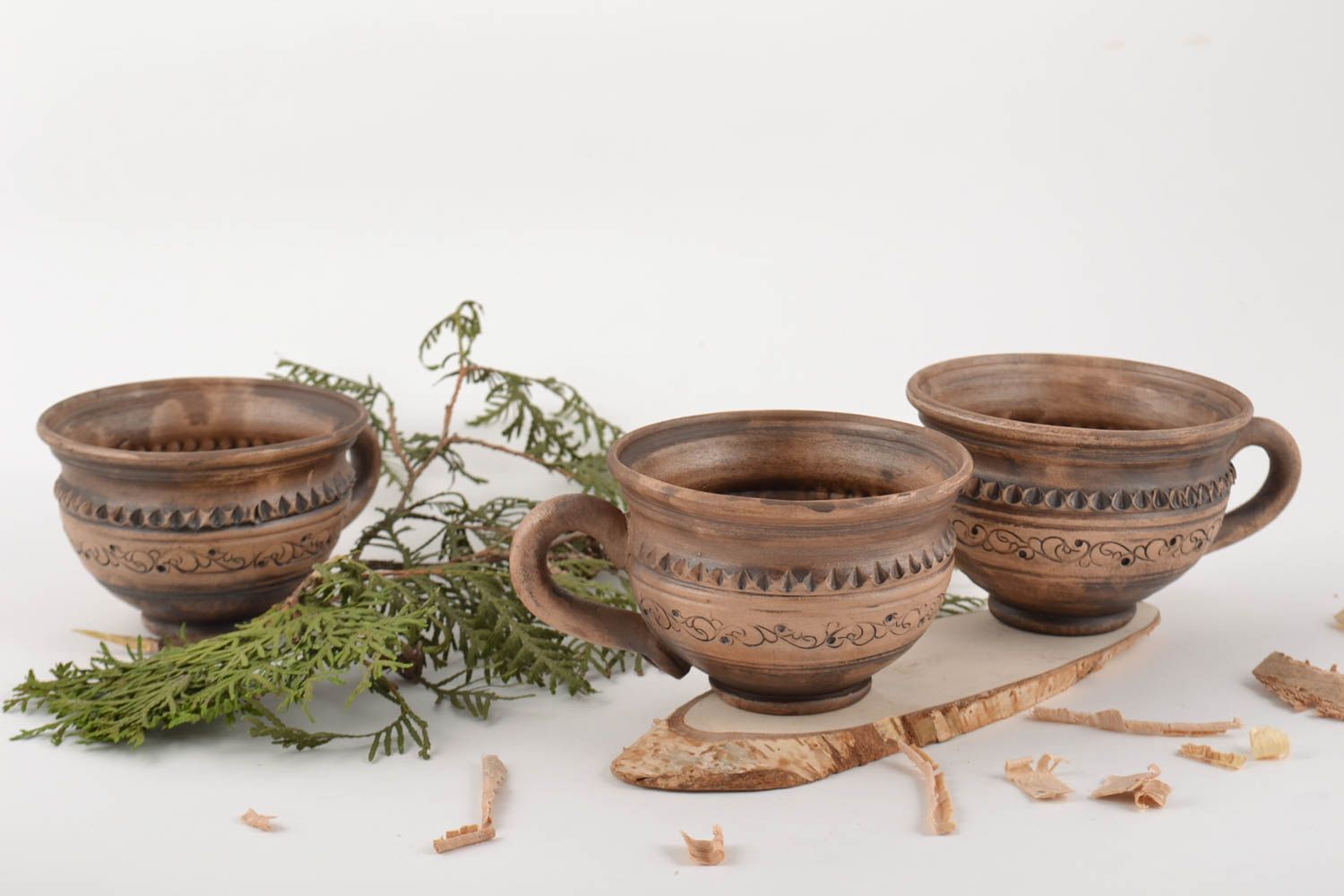 Juego cerámico de tazas de arcilla hechas a mano originales cerámica lechera foto 1