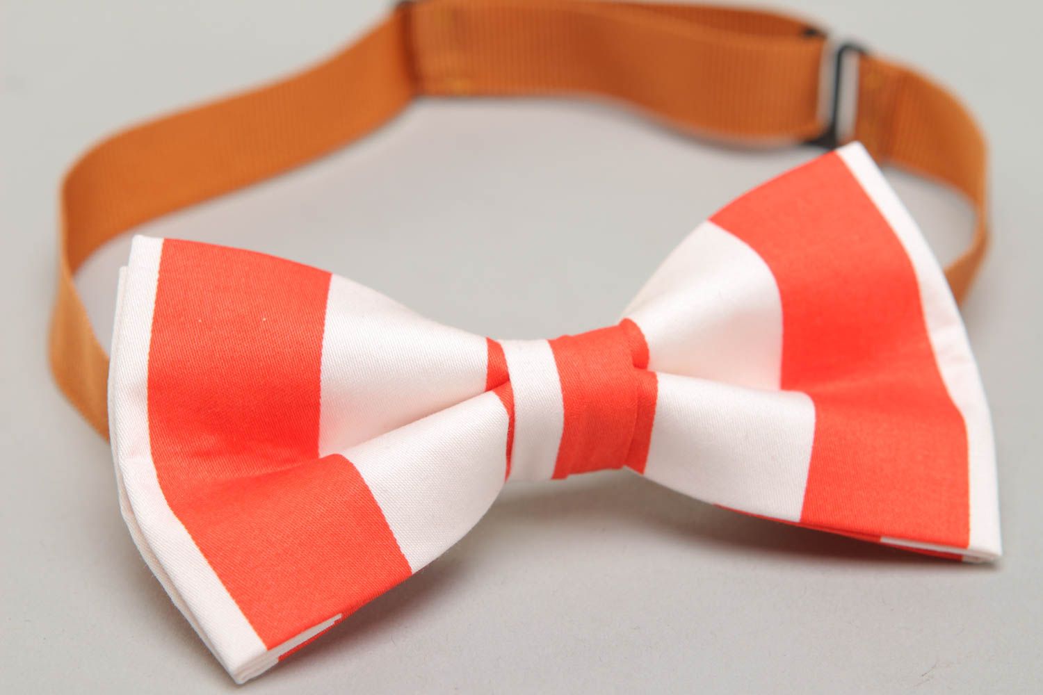 Fabric bow tie of white and red colors photo 2