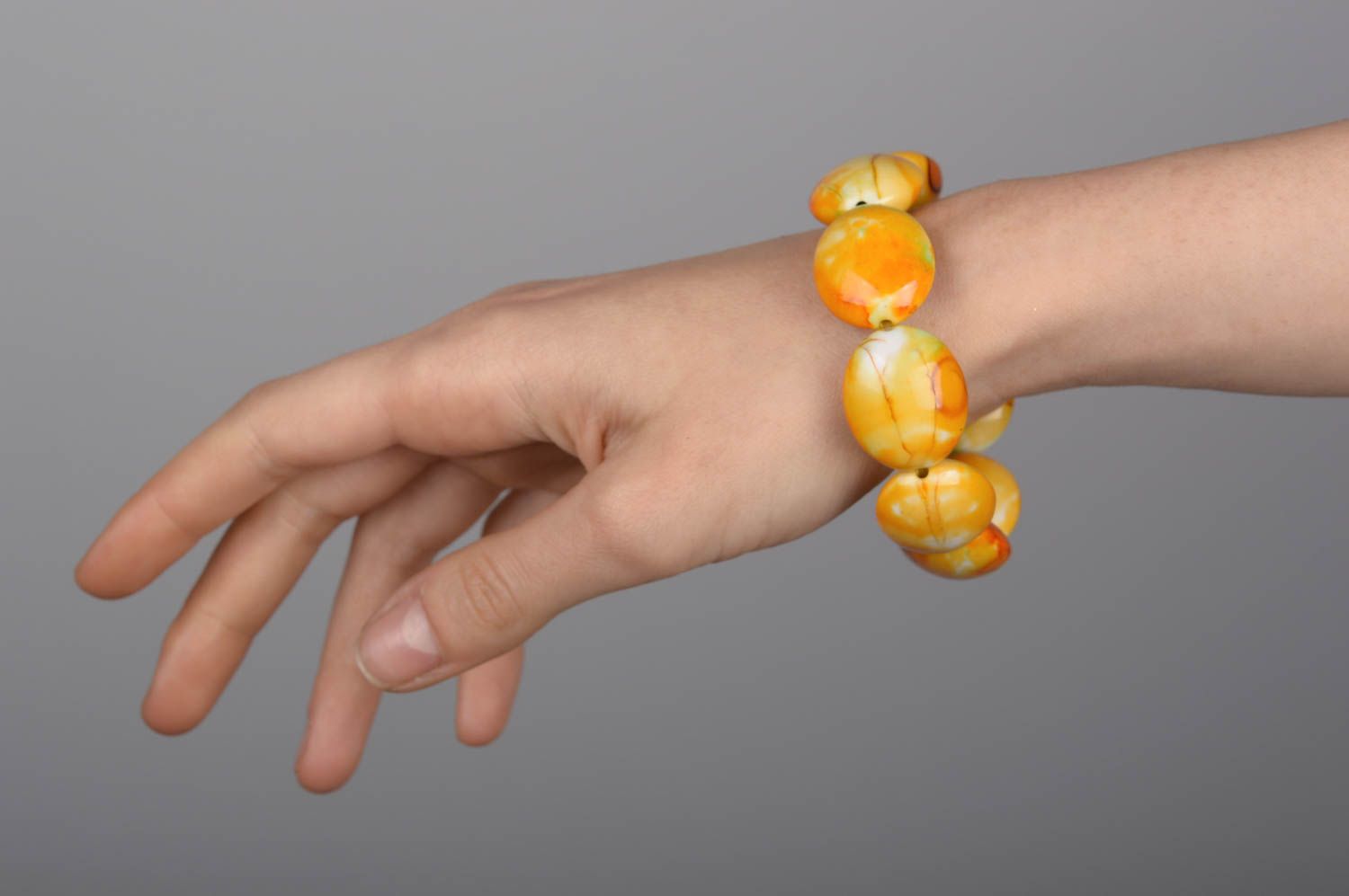 Handmade yellow-orange stretchy bracelet for girls photo 5