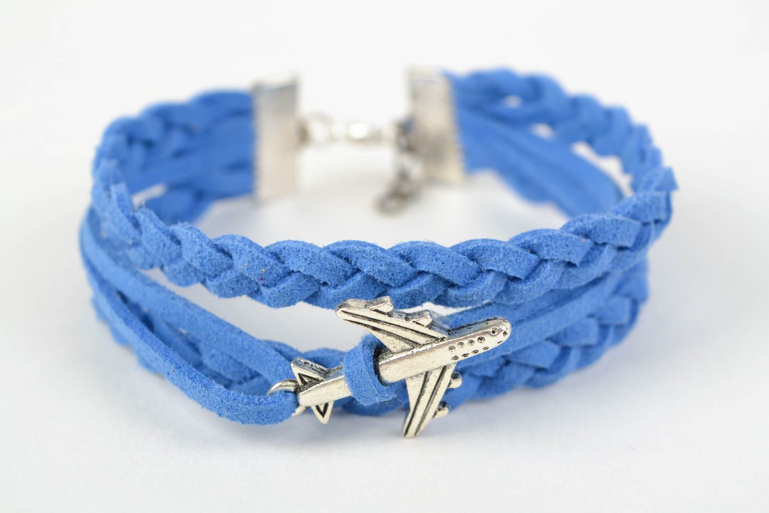 Bright blue handmade woven suede bracelet with charm in the shape of plane photo 3