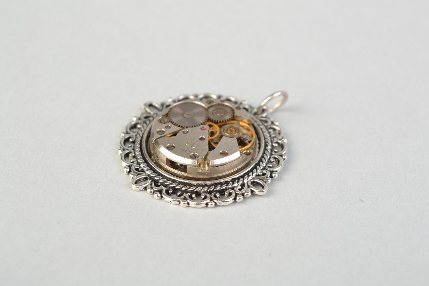 Handmade metal steampunk neck pendant of round shape with clock mechanism  photo 4