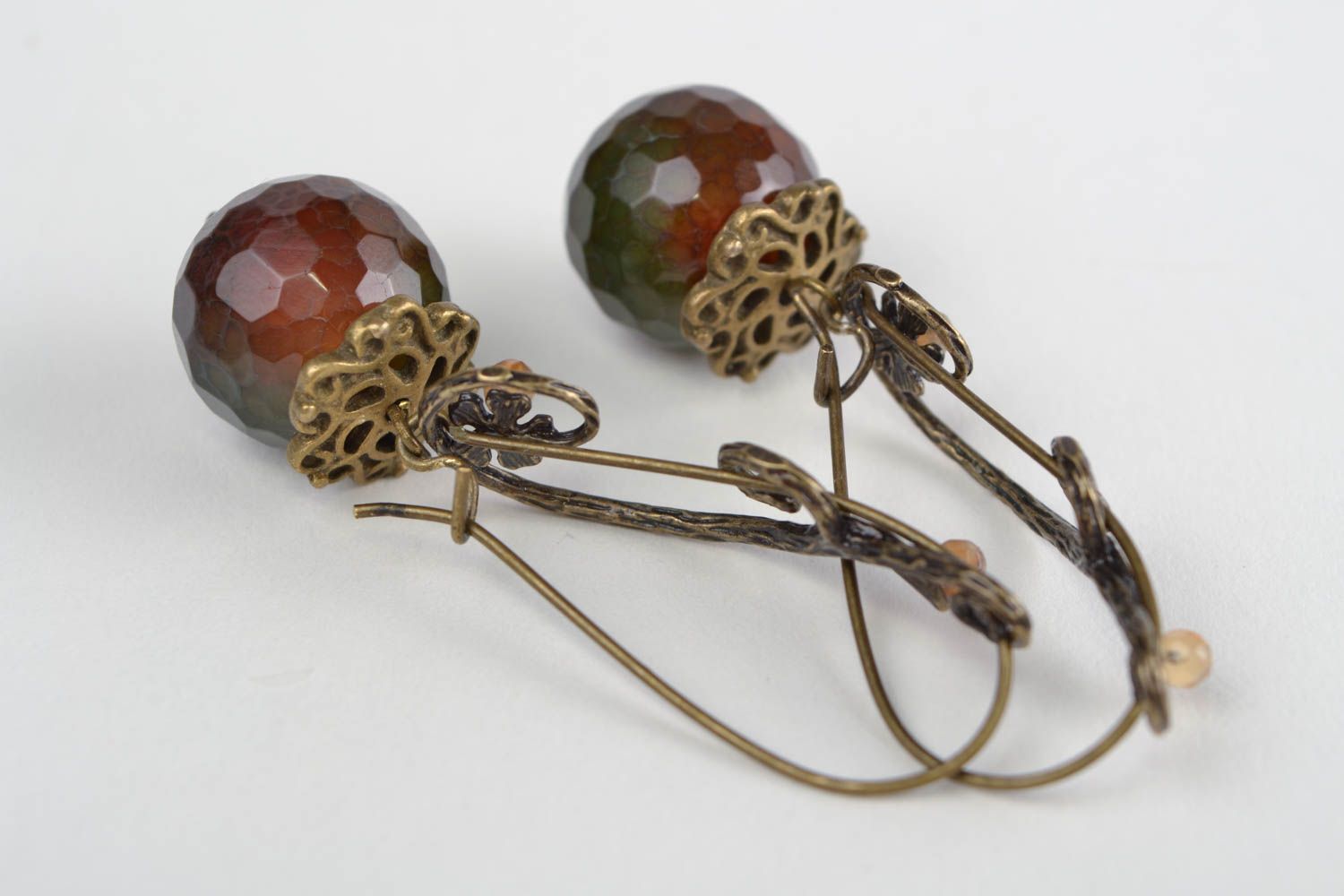 Handmade dangling earrings with fancy metal fittings and snake agate stone beads photo 4