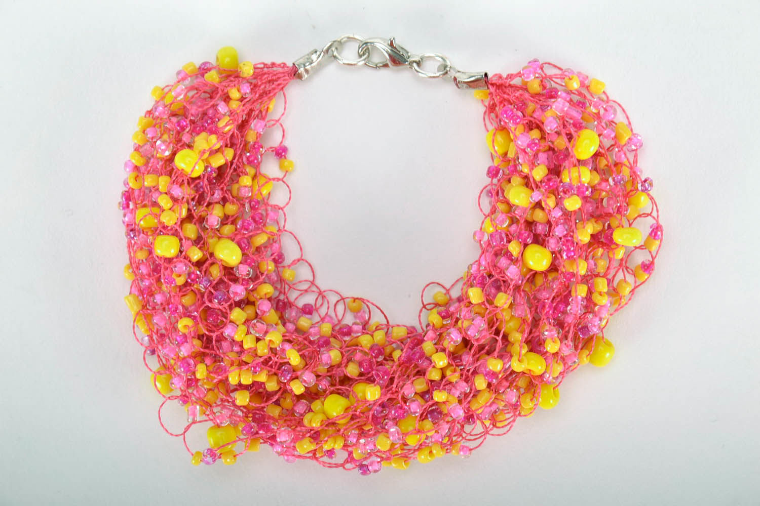 Bracelet de perles de rocaille de couleur rose photo 4