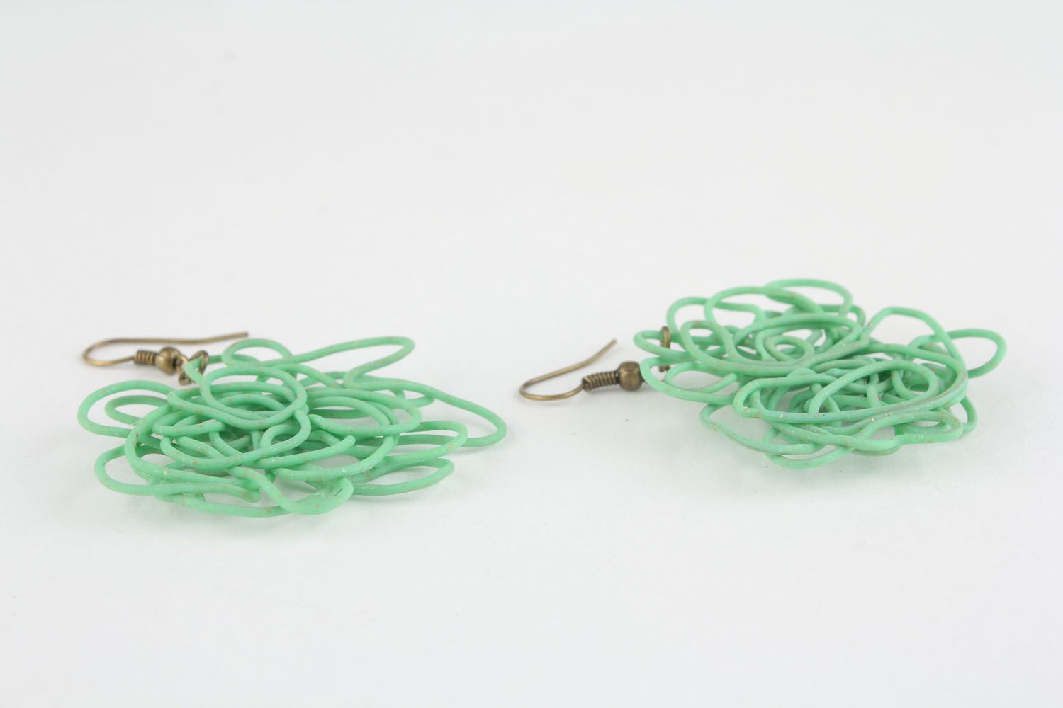 Women's earrings of green color photo 2