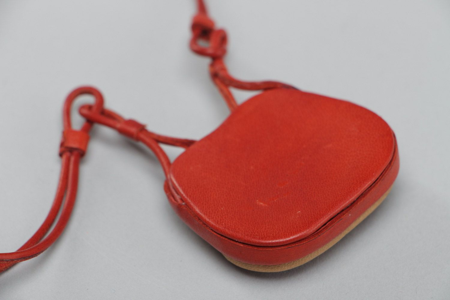 Handmade stylish designer pendant made of genuine leather with red stone  photo 4