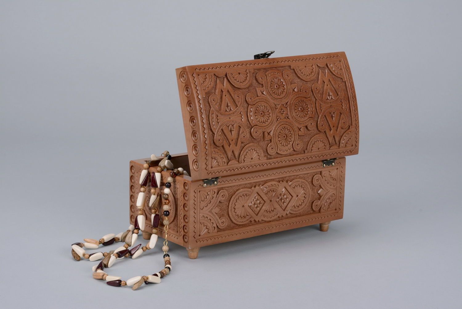 Wooden jewelry box with carving photo 1