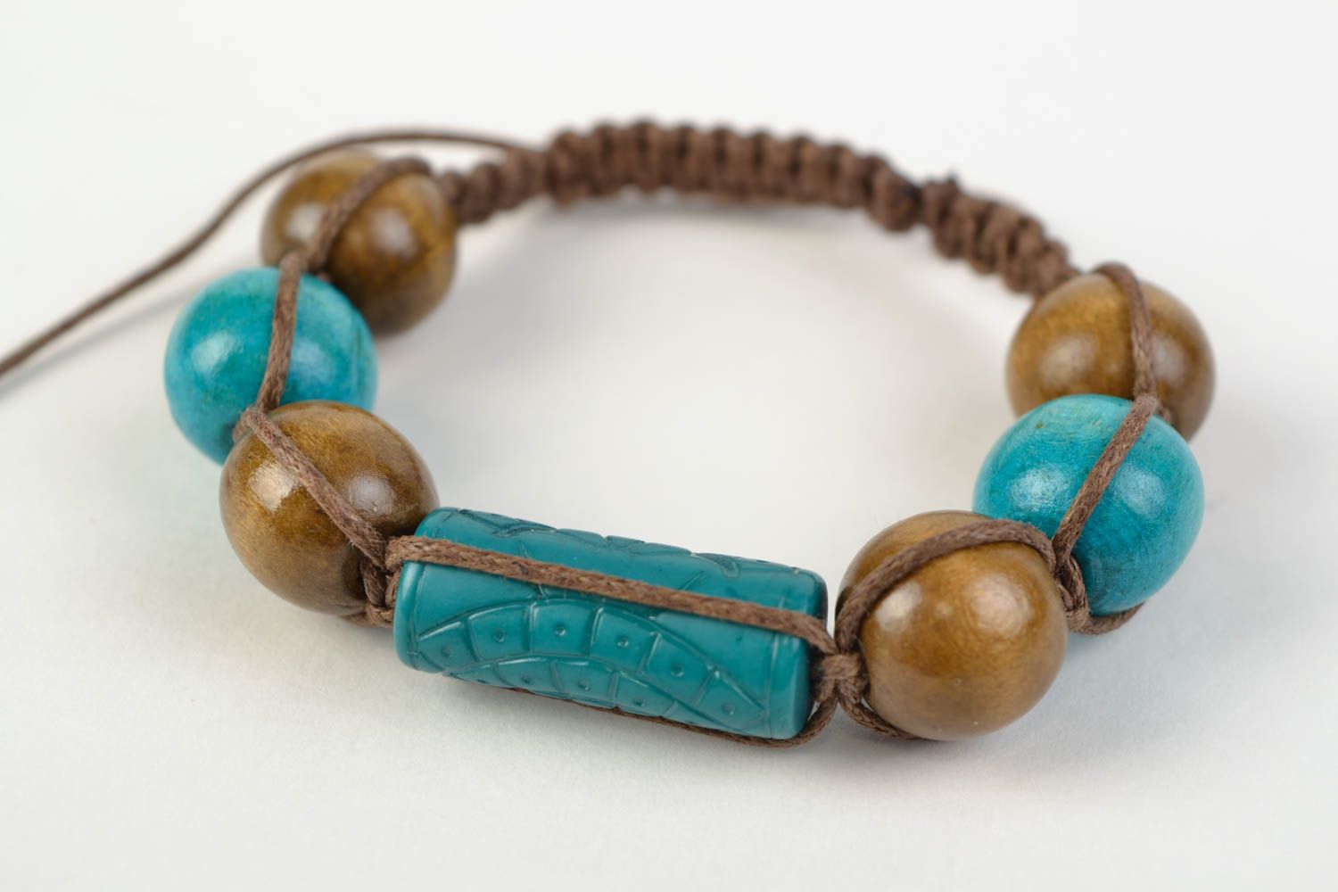 Handmade women's woven cotton cord wrist bracelet with wooden beads photo 1