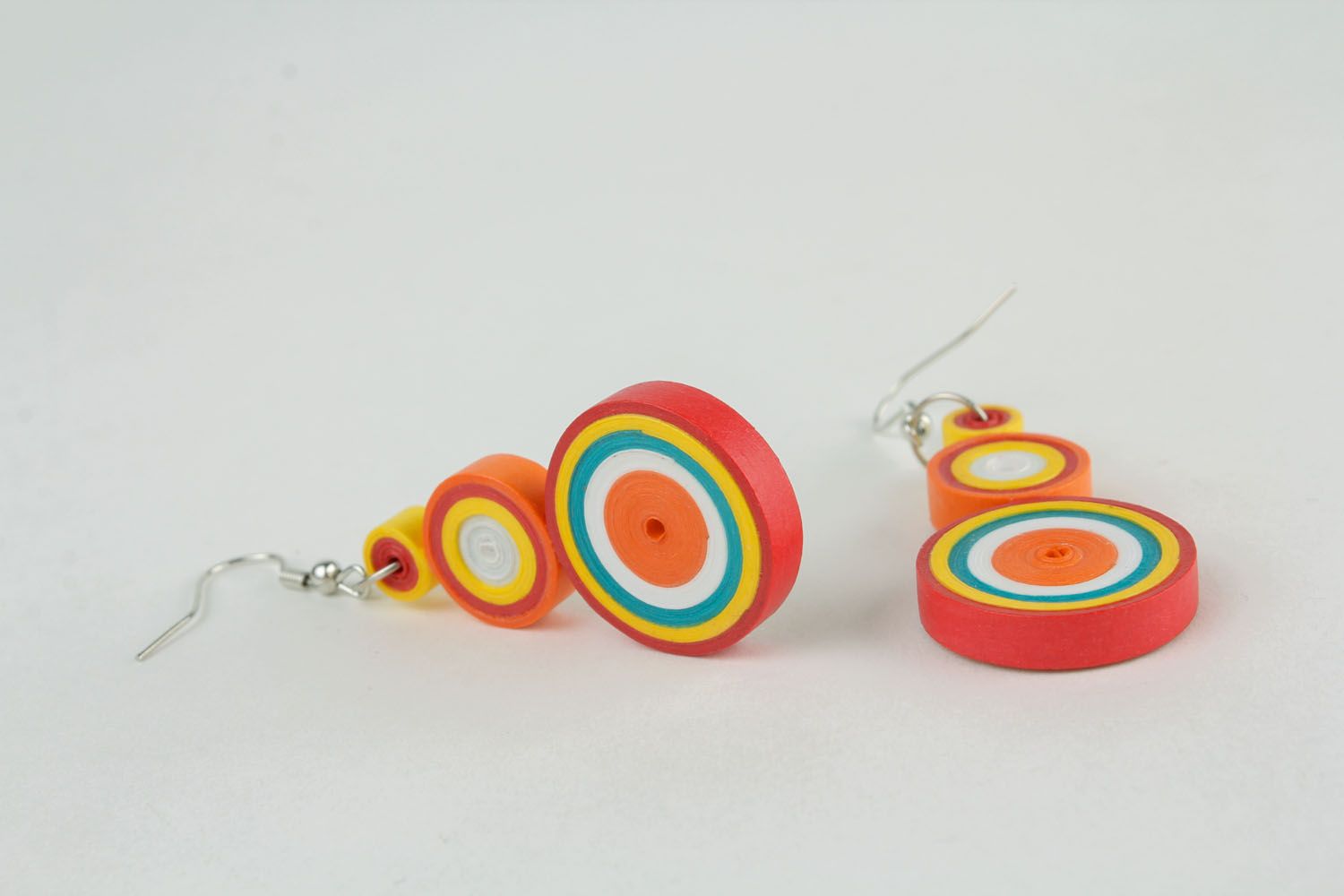 Colorful earrings made using quilling technique photo 3