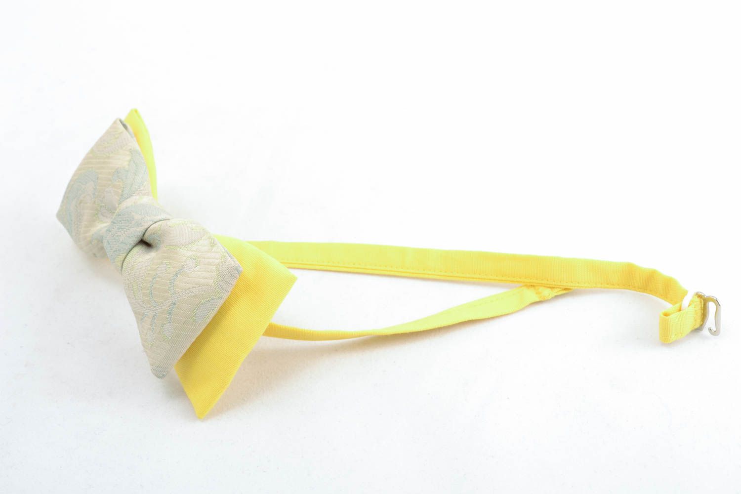 Fabric bow tie of yellow color photo 1