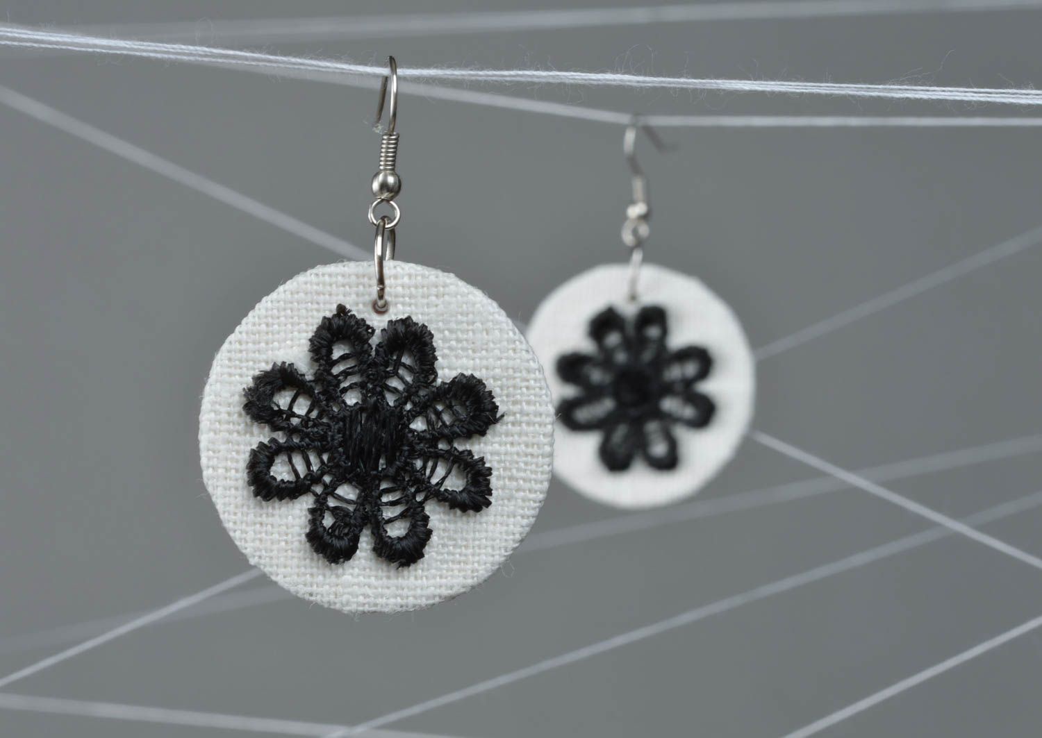 Beautiful handmade designer textile embroidered earrings with black flowers photo 1