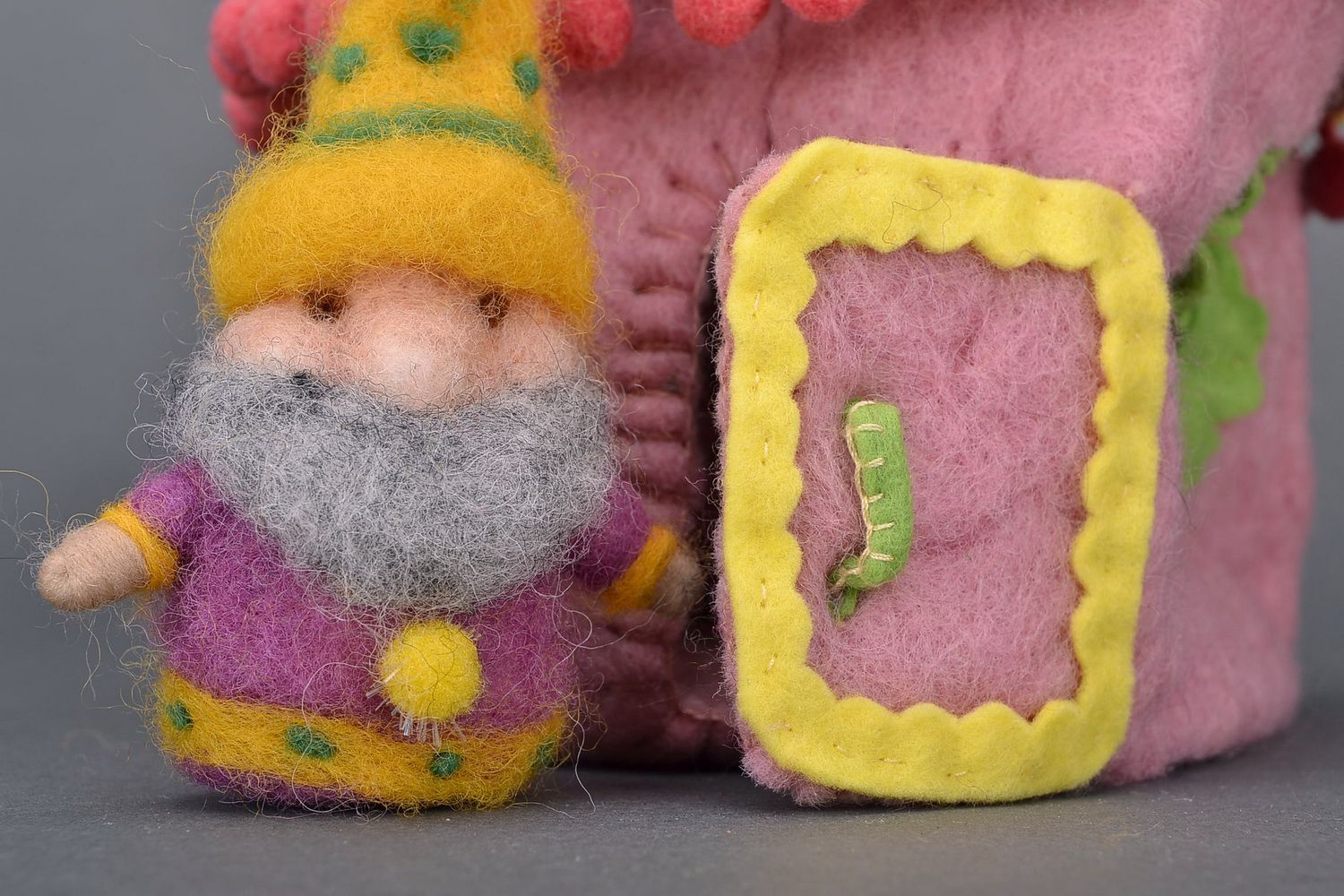 Toy made from wool Gnome in the house photo 1