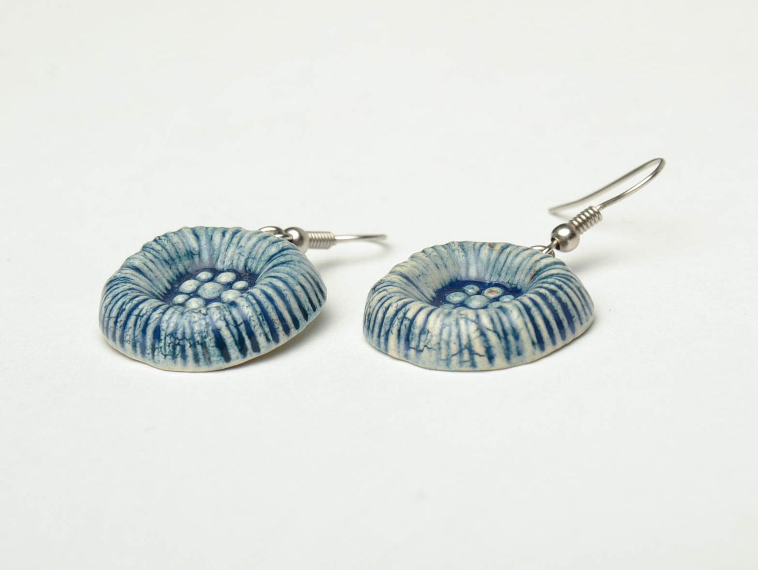 Handmade ceramic earrings with enamel painting of blue and white colors photo 3