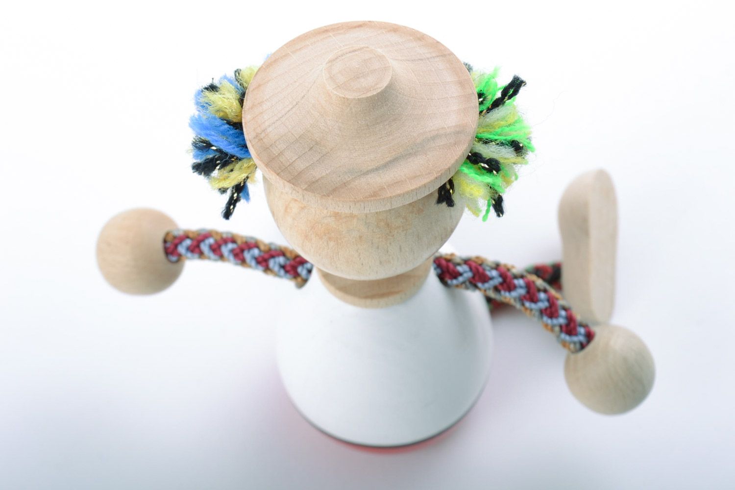 Детская игрушка из дерева расписанная красками ручной работы в виде яркого клоуна фото 5