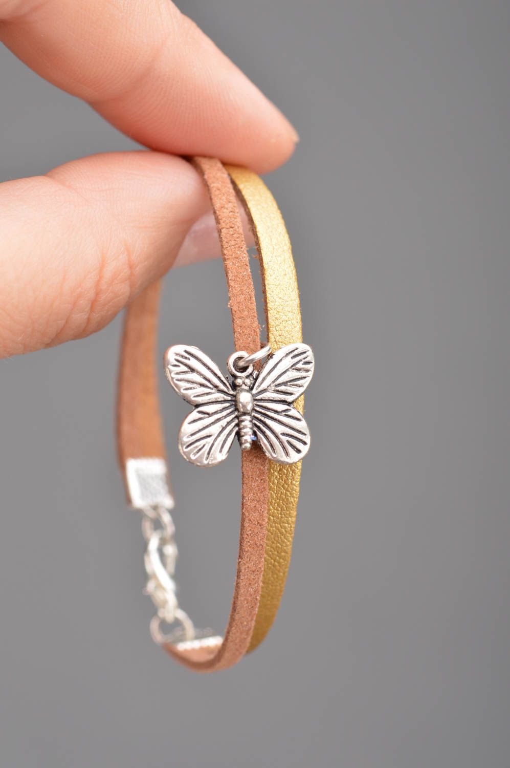 Handmade thin genuine leather wrist bracelet with butterfly charm beige and gold photo 2