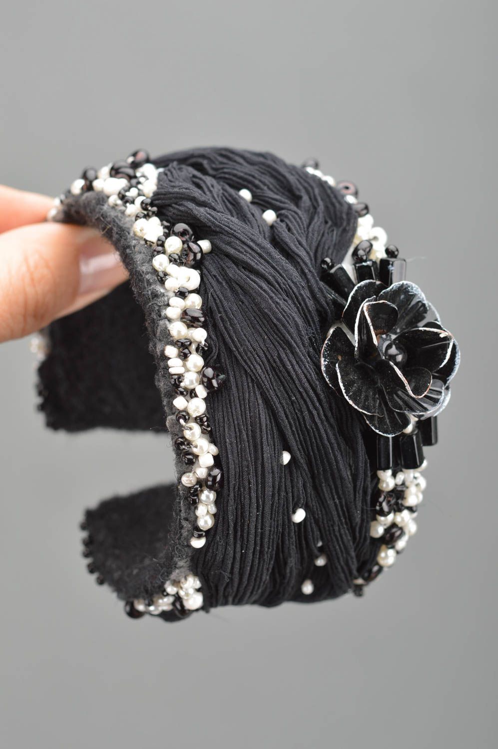 Fabric handmade wide bracelet in black color decorated with flower and beads photo 4