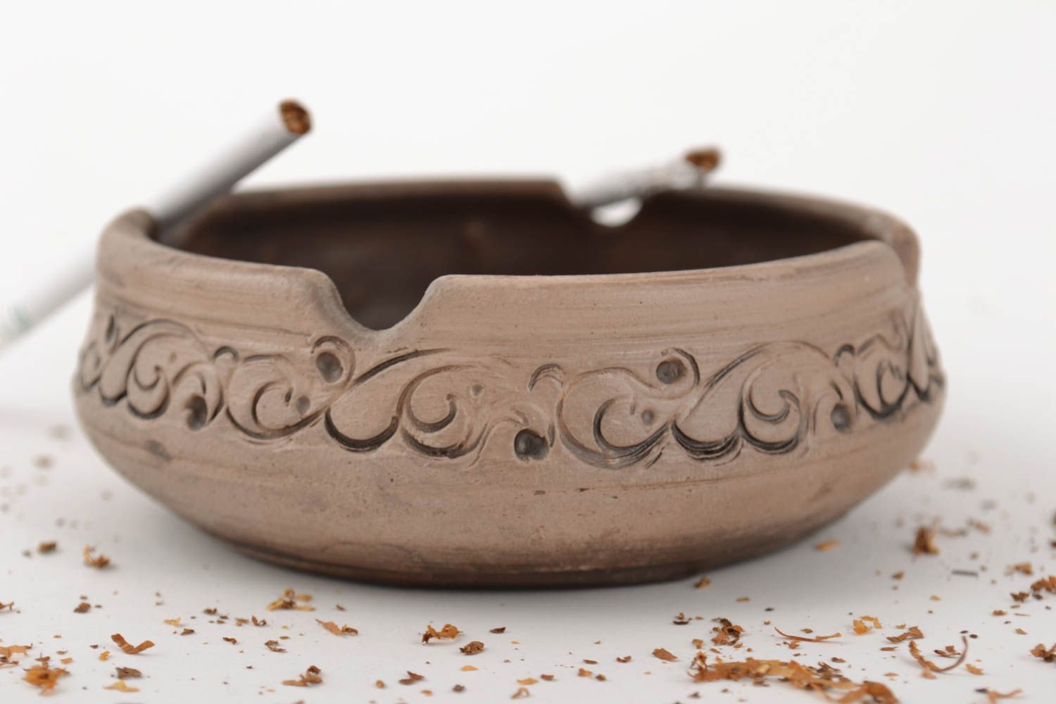 Handmade decorative ornamented ceramic ashtray molded using pottery technique photo 1