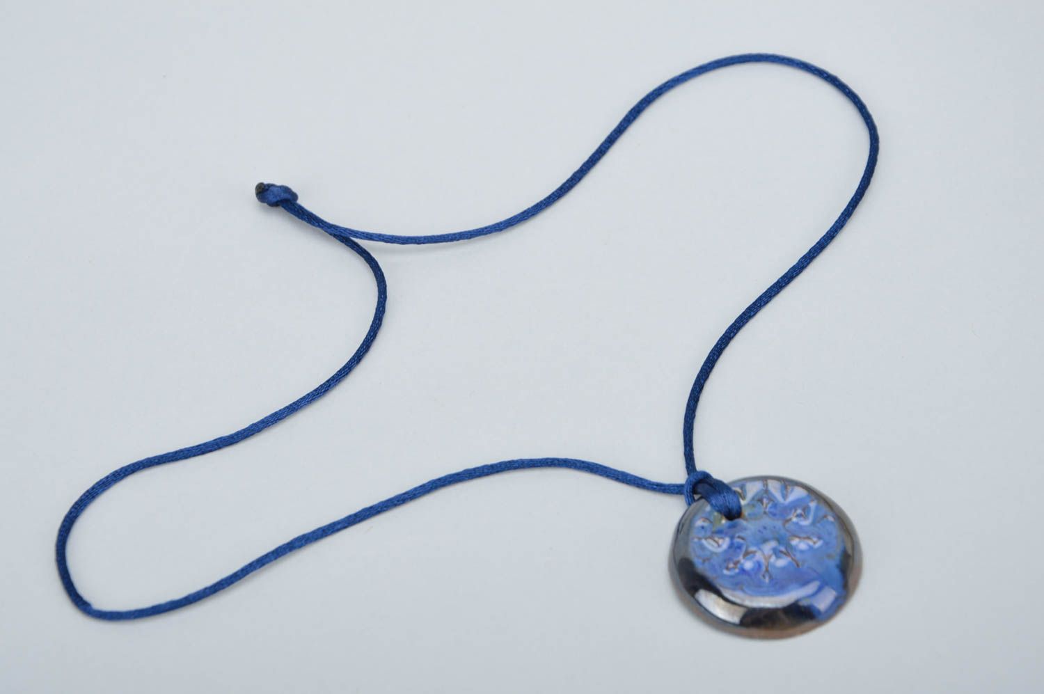 Blue clay handmade unusual designer stylish beautiful round pendant on lace photo 2