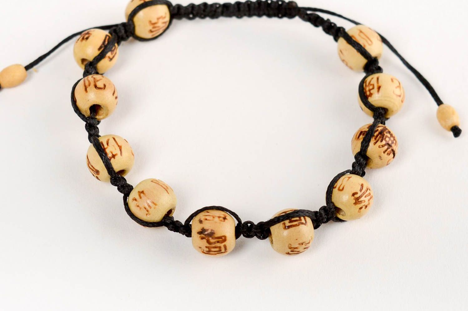 Handmade designer wrist bracelet woven of cord and wooden beads unisex photo 4