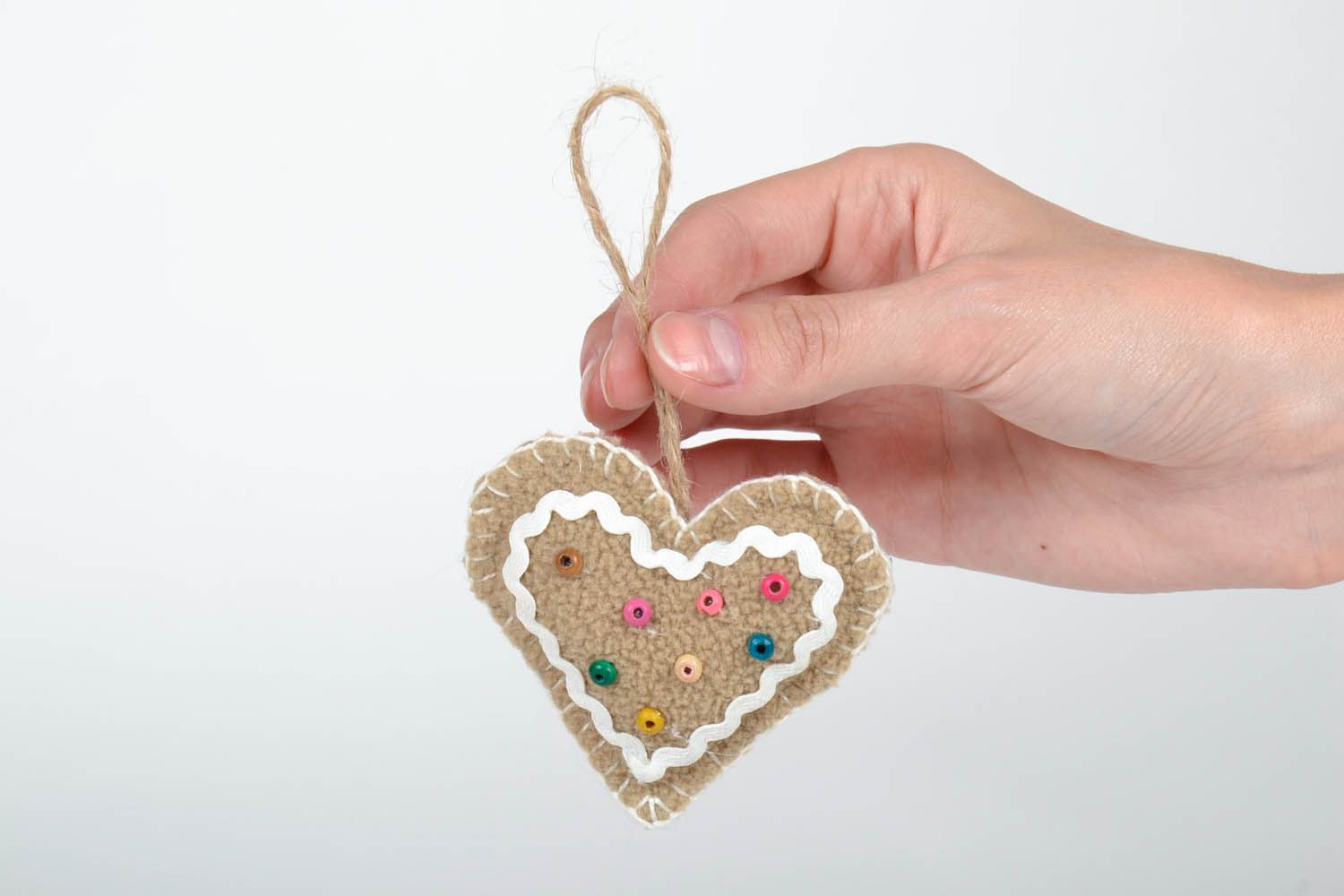 Мягкая новогодняя игрушка в форме сердца фото 5