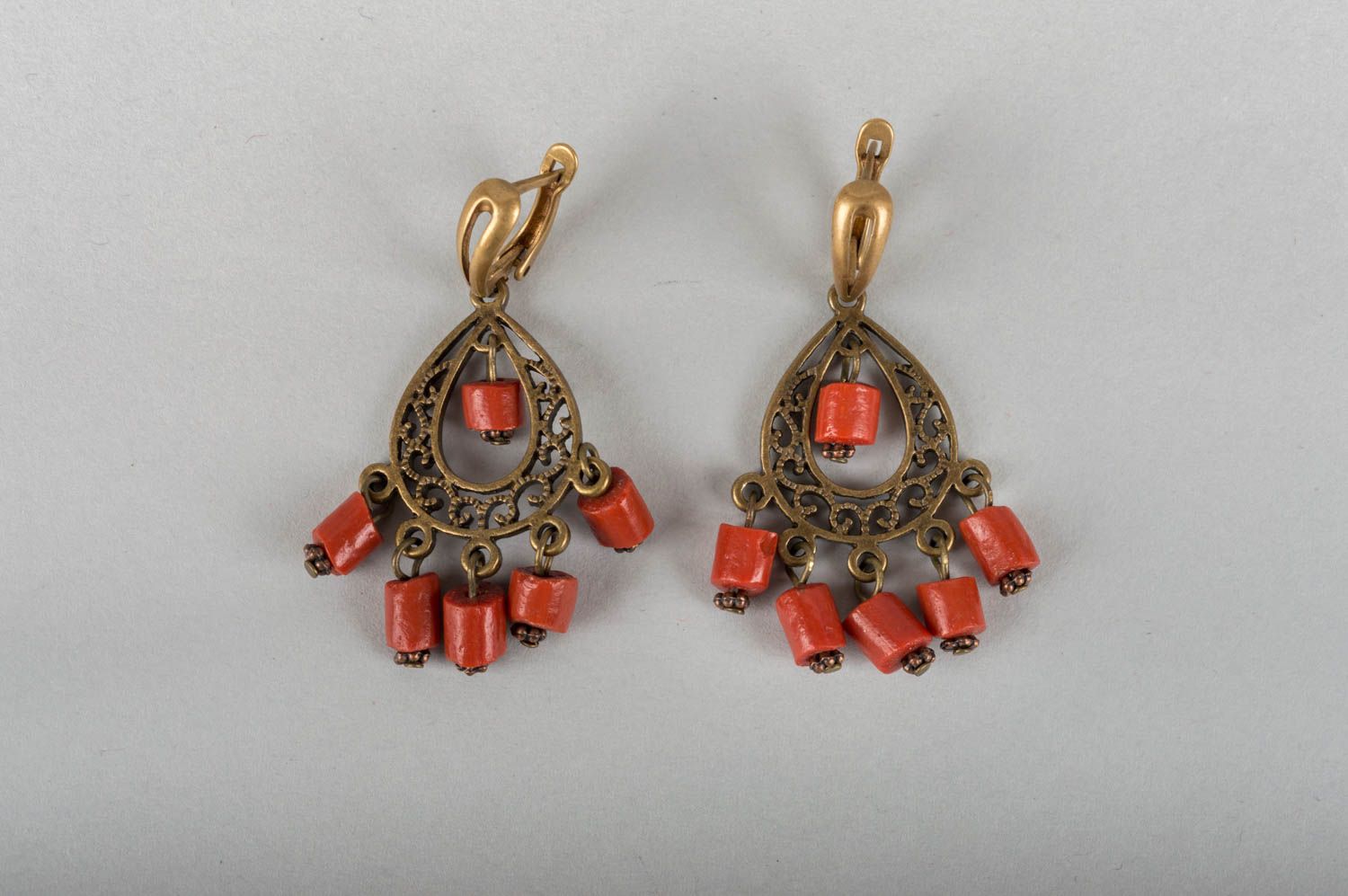 Handmade cute earrings made of natural stone coral with brass fittings photo 2