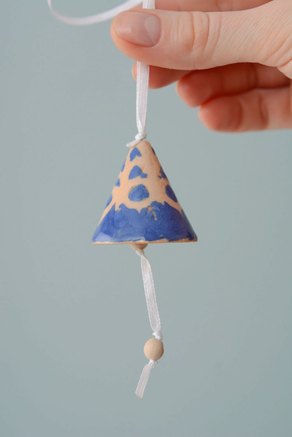 Painted clay bell photo 4