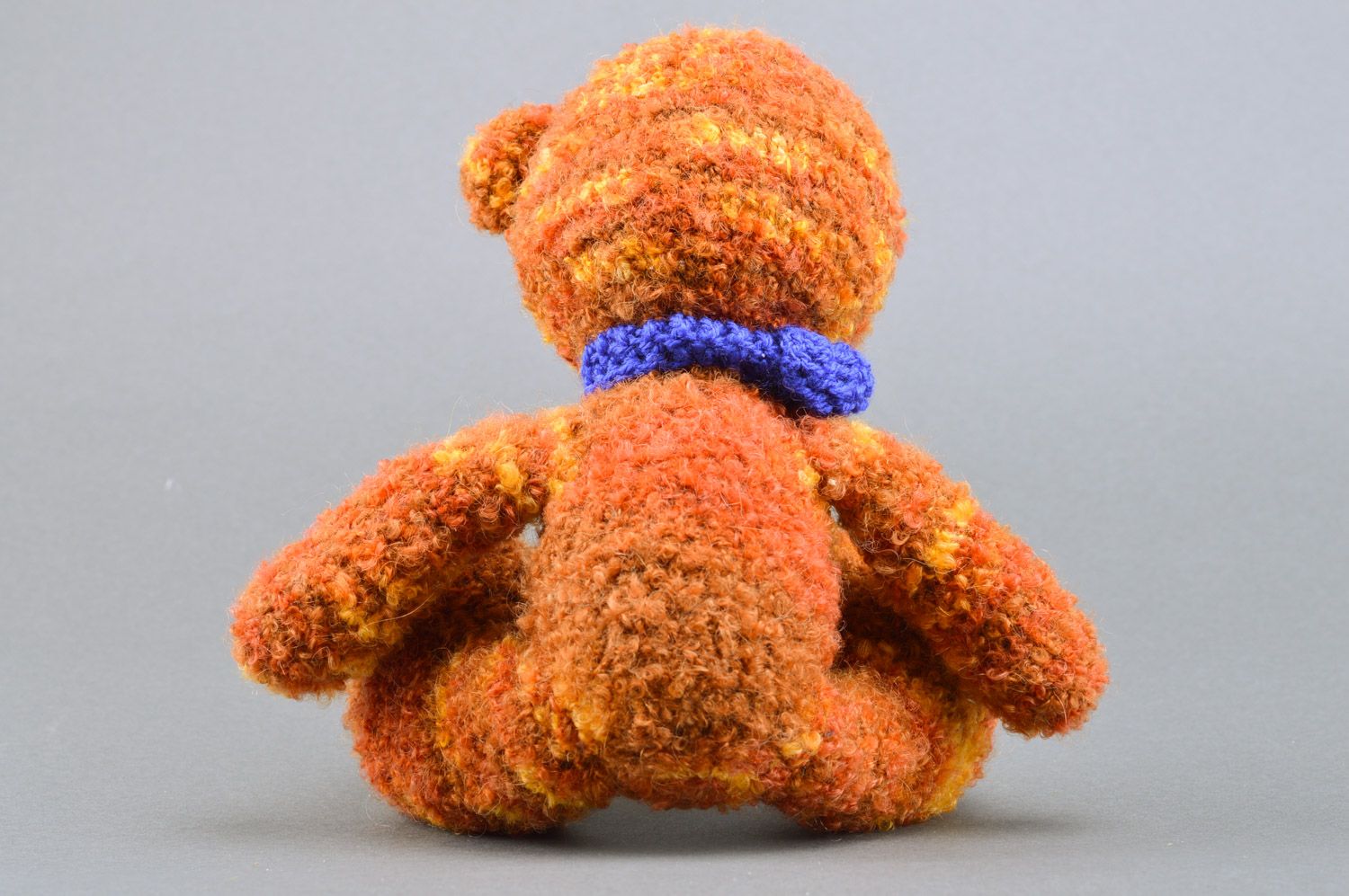 Handmade crochet soft toy in the shape of brown bear with blue scarf for children photo 5