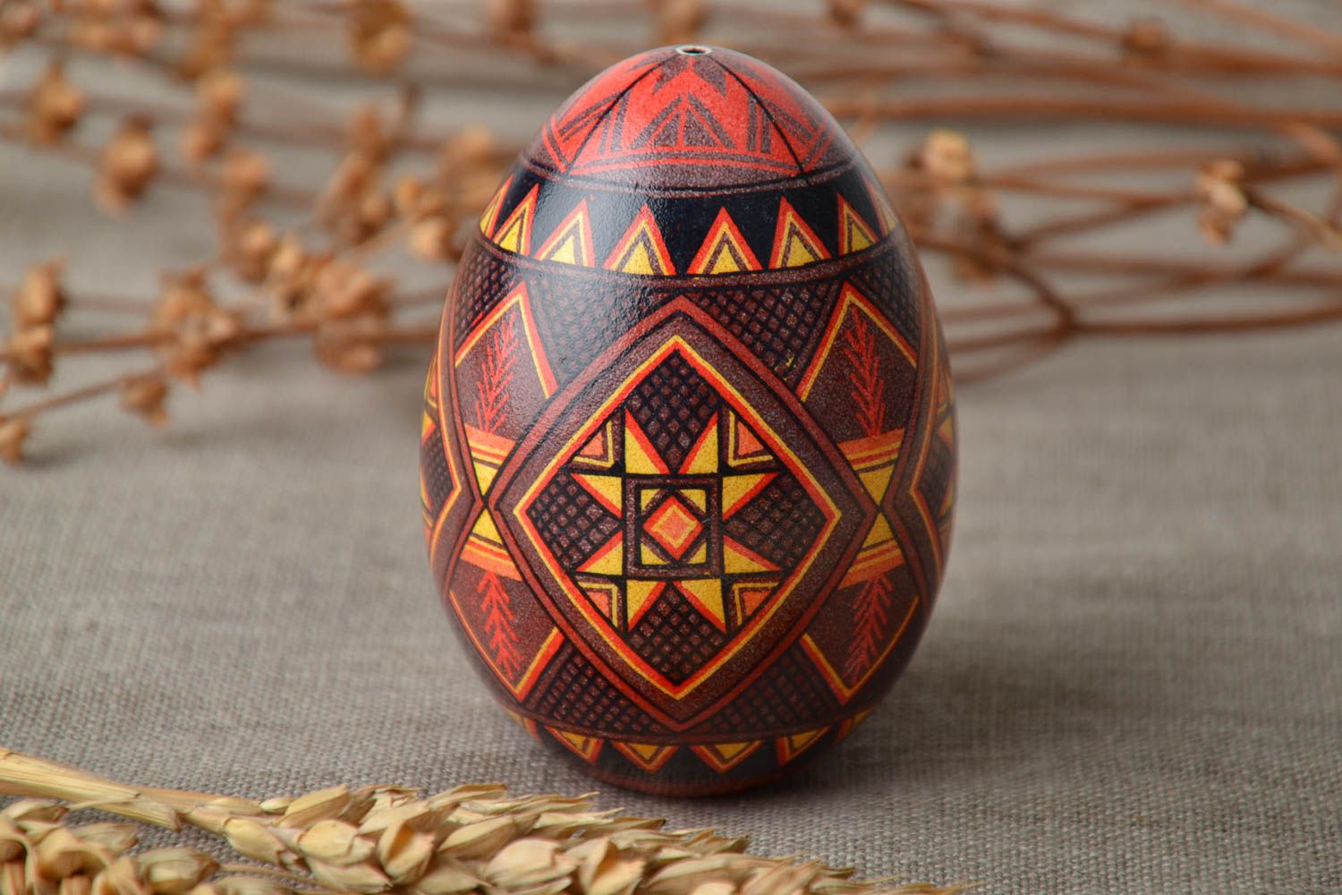 Handmade Easter egg with traditional symbolics photo 1