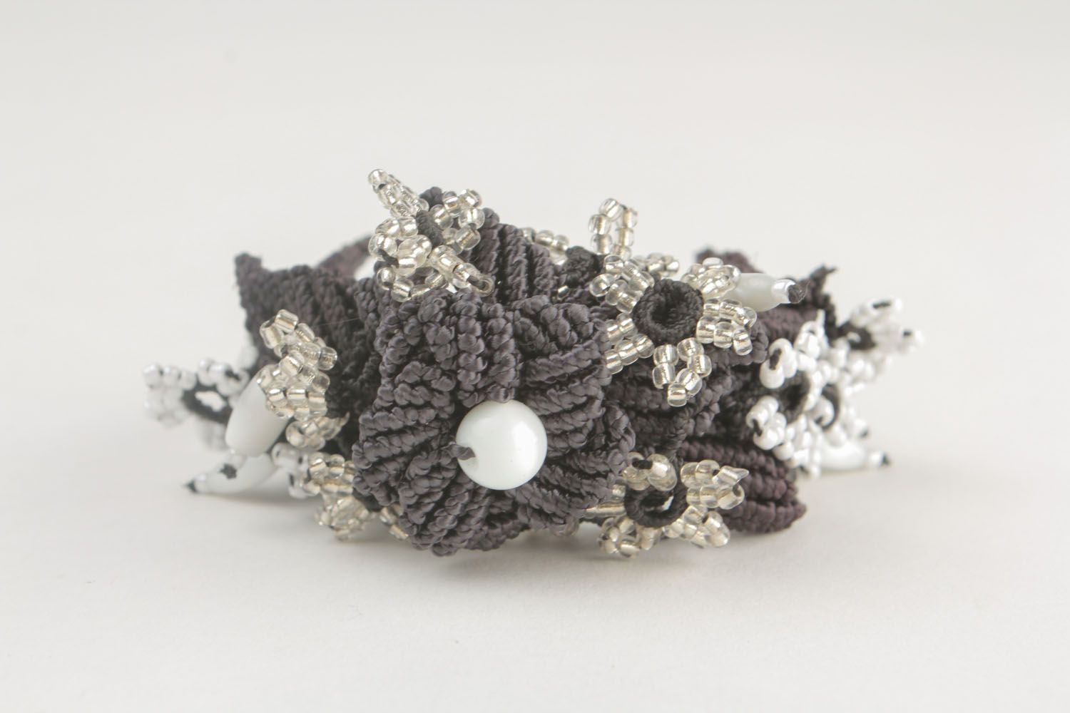 Black and white textile bracelet photo 4
